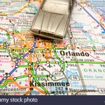 Model Sedan On A Road Map Of Orlando And Kissimmee Fl Stock Photo   Road Map Of Orlando Florida
